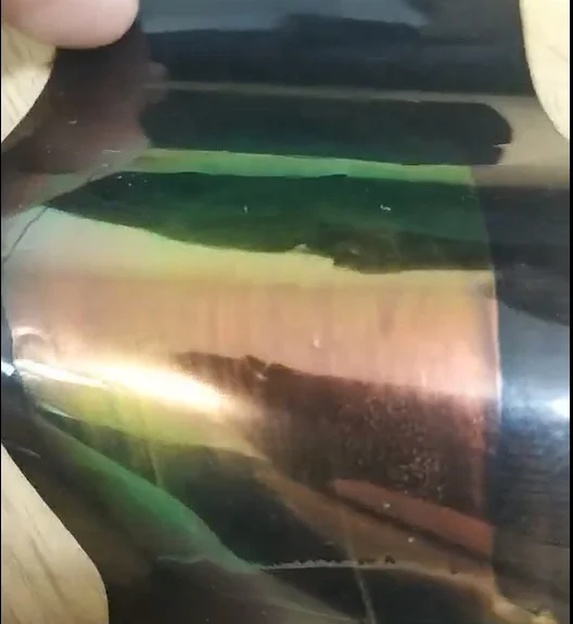 Liquid crystal color changing UV ink green to blue