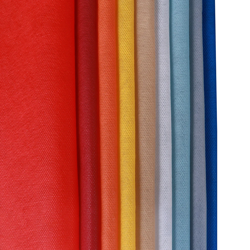 Non Woven Fabric Bag tie Interlining Spun bond Polypropylene non woven  color shopping bag production  material