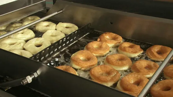 HOT Yufeng 304 stainless steel industrial donut making machines cake machine automatic Can be fried and automatically rolled