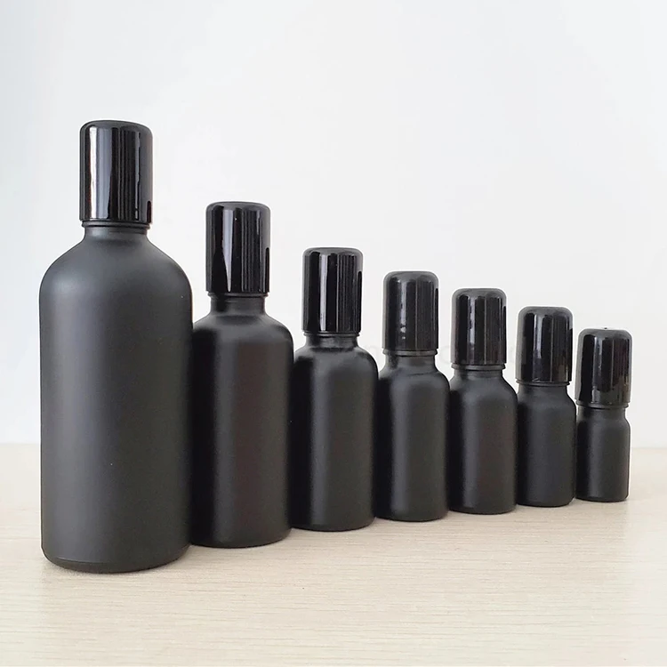 Customized wholesale 30ml 50ml matte black frosted Glass Roll on Bottle with Metal Stainless Roller Ball for essential oil