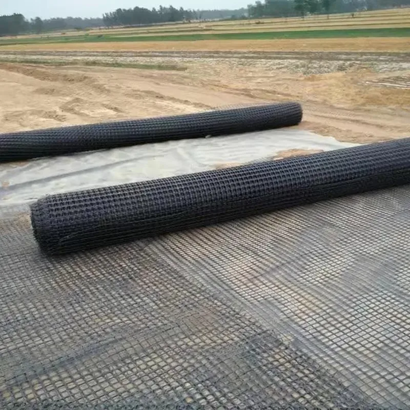 China Factory Price Fiberglass Mesh Biaxial Geogrid Fiberglass Geogrid 50KN 100KN Bitumen Coating Airport Driveway Asphalt Road