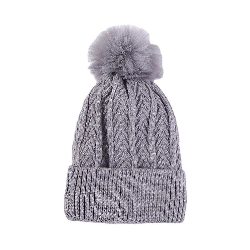 Женская трикотажная шапка из жаккардовой шерсти с помпоном