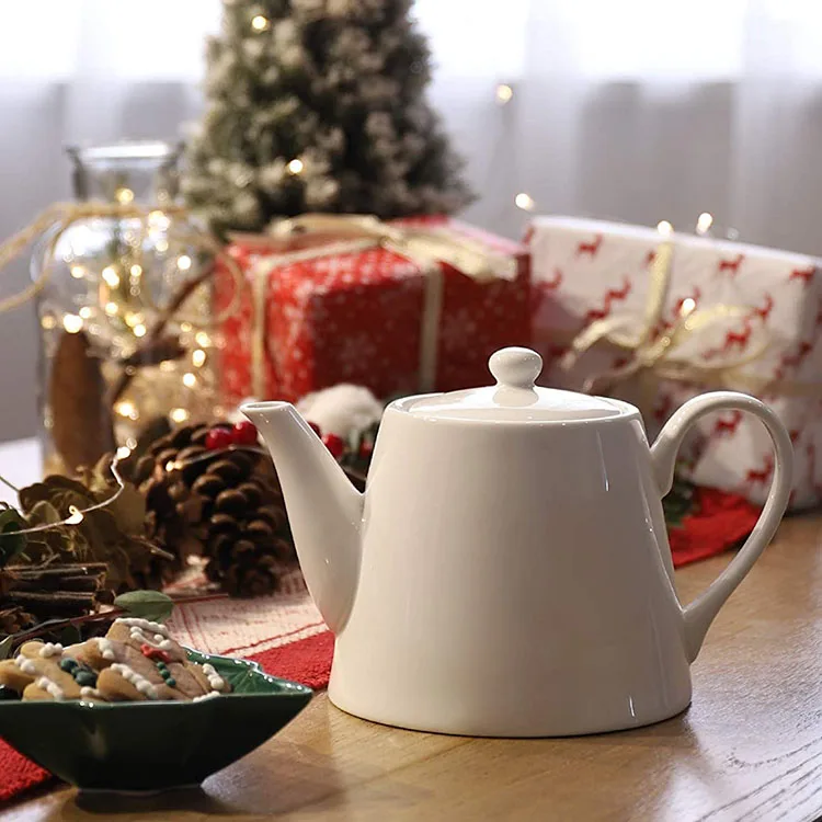Wholesale cheap afternoon tea time used white porcelain teapot / custom modern ceramic tea pot