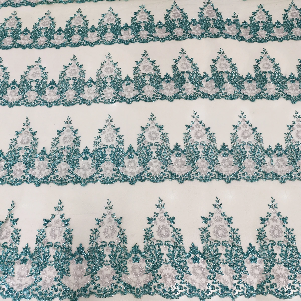 Новейшие разработки вы сможете увидеть в полиэстер нигерийские Свадебные блестящие наклеенными кружевная ткань с блестками зеленого цвета границы тюль сетка из ткани на заказ отделки