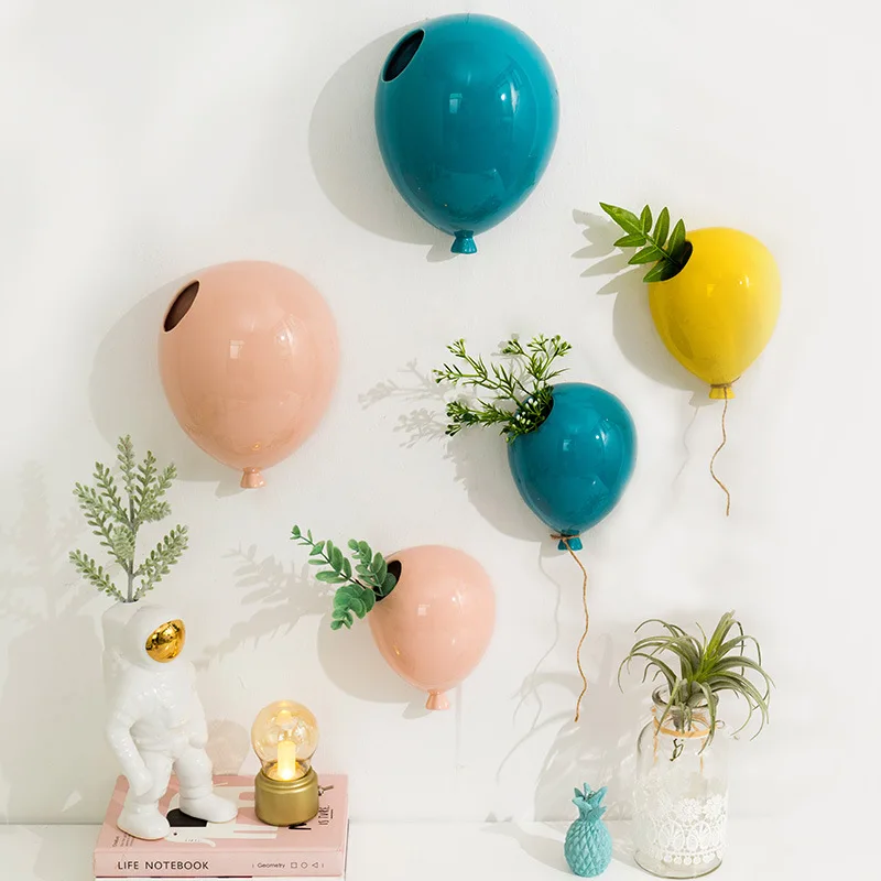 
Creative vases on the wall of a cake and ice cream shop 