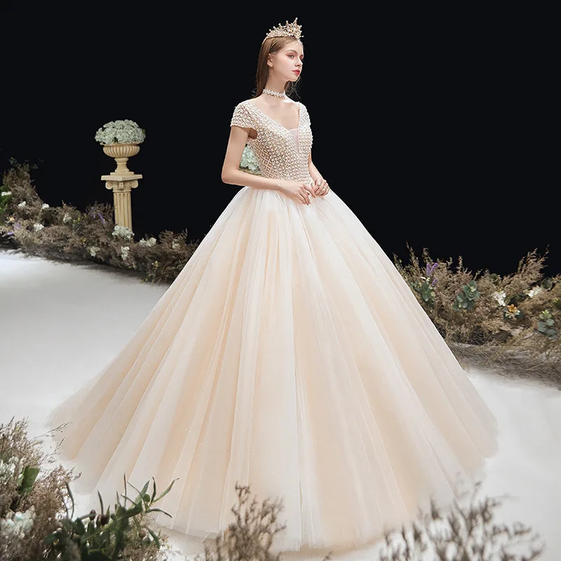 Luxury robe de mariage Simple Heavy Beaded Pearls Wedding Dress Half Sleeve Bridal Gowns