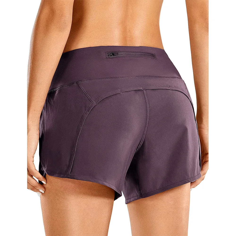 Женские быстросохнущие спортивные шорты для занятий йогой, бега и тренировок с карманами на молнии