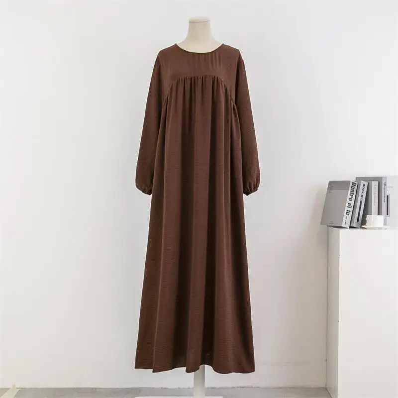 Muslim loose plus size long sleeved solid color pullover robe dress spring and autumn knee length long skirt dress OEM