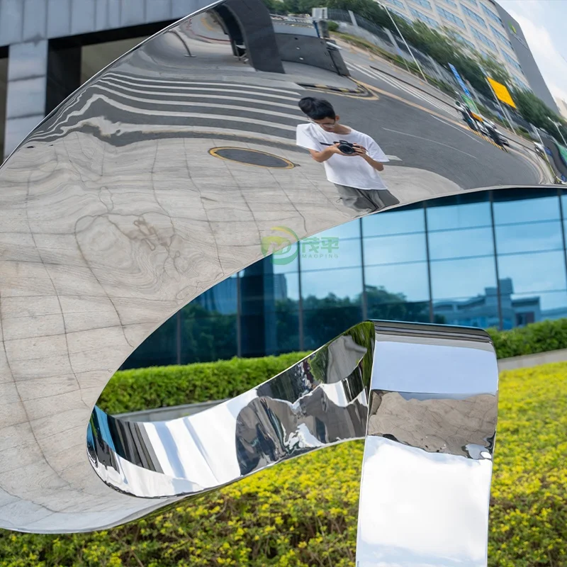 Large stainless steel sculpture in the park business square