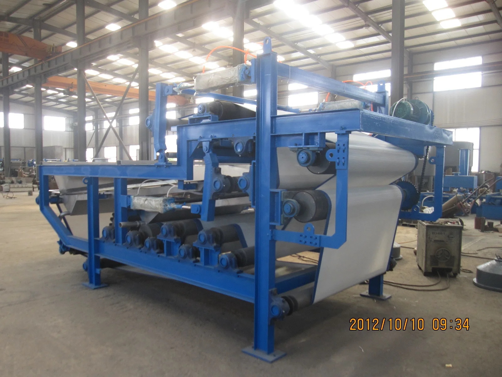 mechanical wood recycled paper pulp de-watering double belt type filter press machine