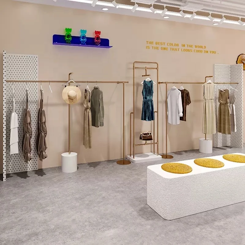 Custom Gold Wall clothing Display Stand clothes Shelf Store Decoration Store Design for Shop