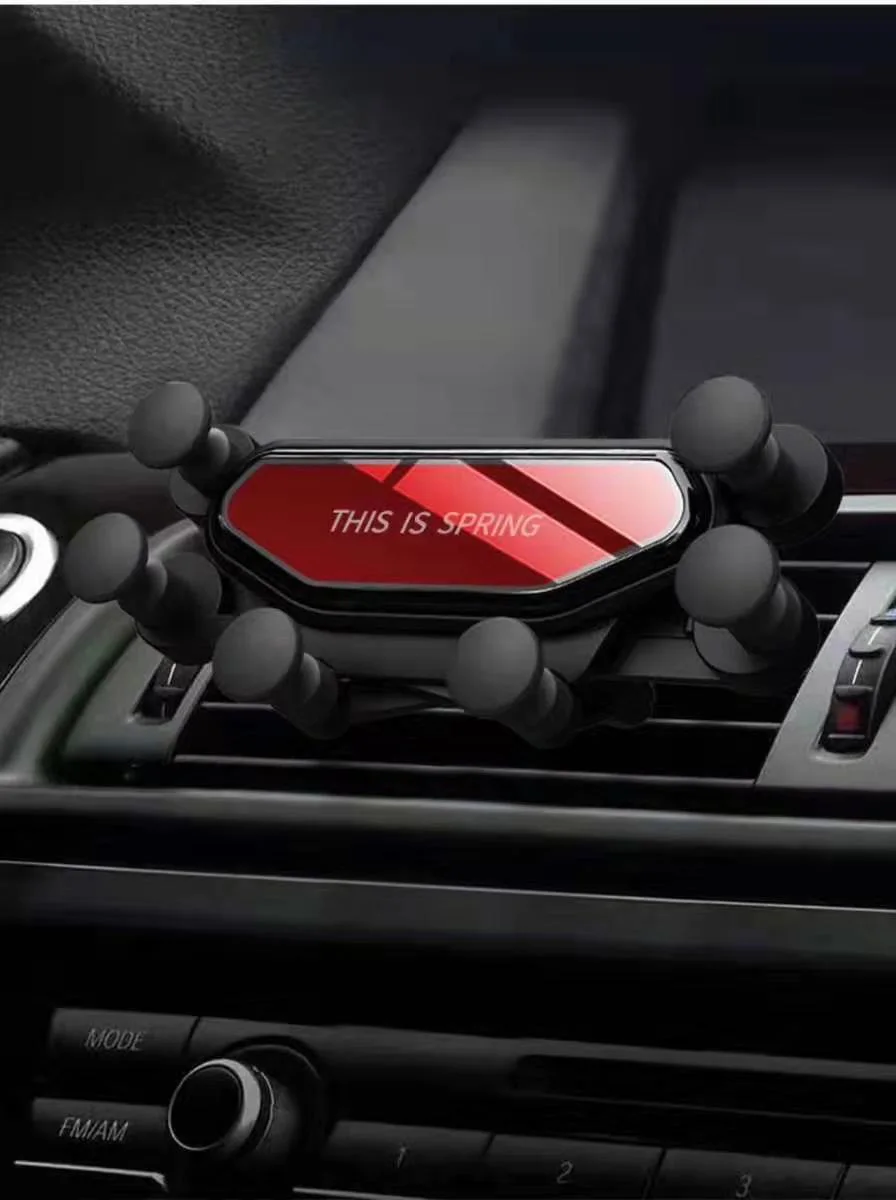 A car gravity mobile phone bracket new car air outlet bracket car gift fixed mobile phone bracket manufacturer