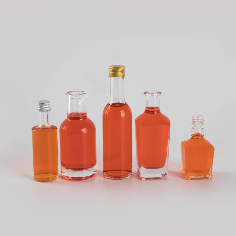 Wholesaler Round Limoncello Whiskey Rum Tequila Gin Bottles 50ML 100ML Mini Shot Bottles for Wedding Favors