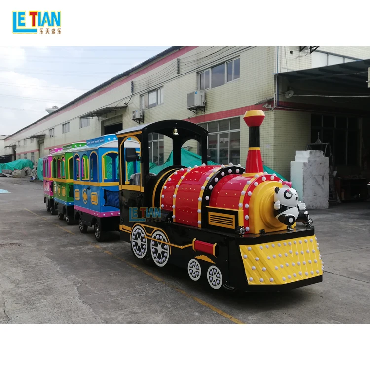 Attractive outdoor playground tourist train prices amusement park kids trackless train rides for sale