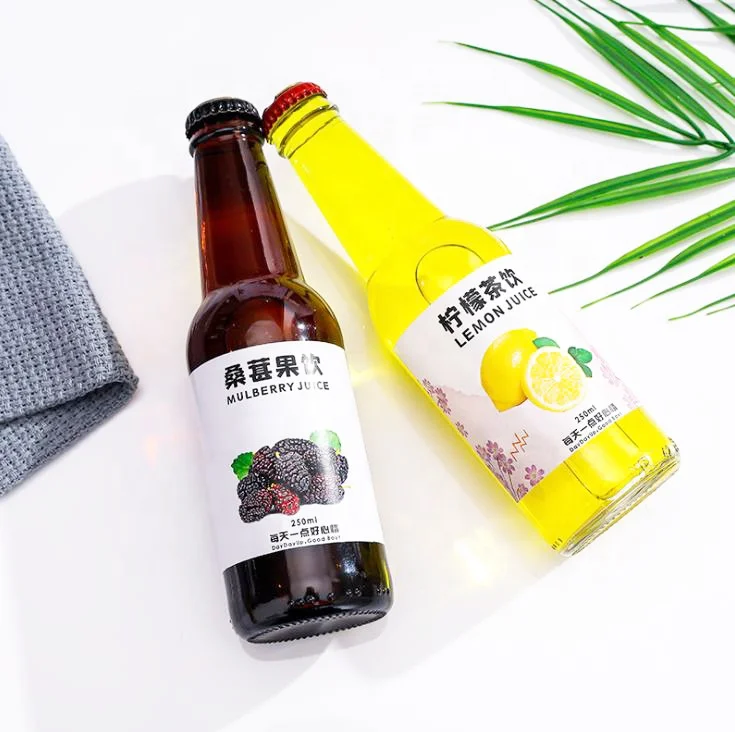 Stocked 330ml clear transparent amber empty sparking soda water carbonate beverage cocktail breezer beer glass bottle with lid