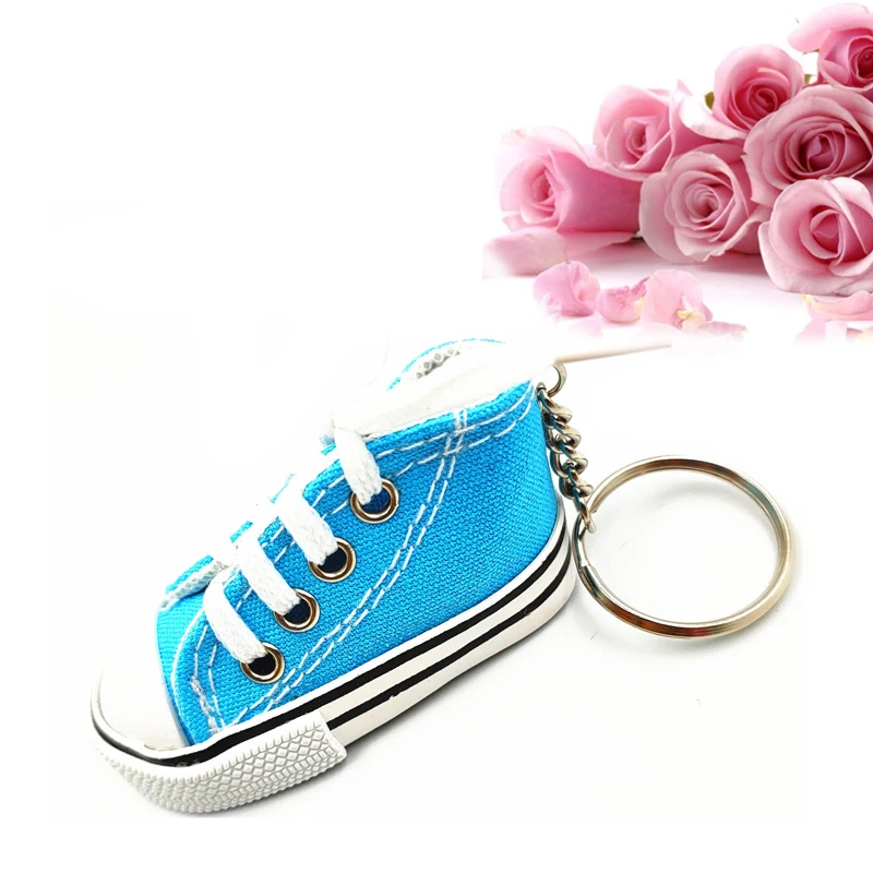 Customizable Mini simulation pvc 3d rubber canvas shoes keychain soccer  sports shoes car personalized keychain creative gifts