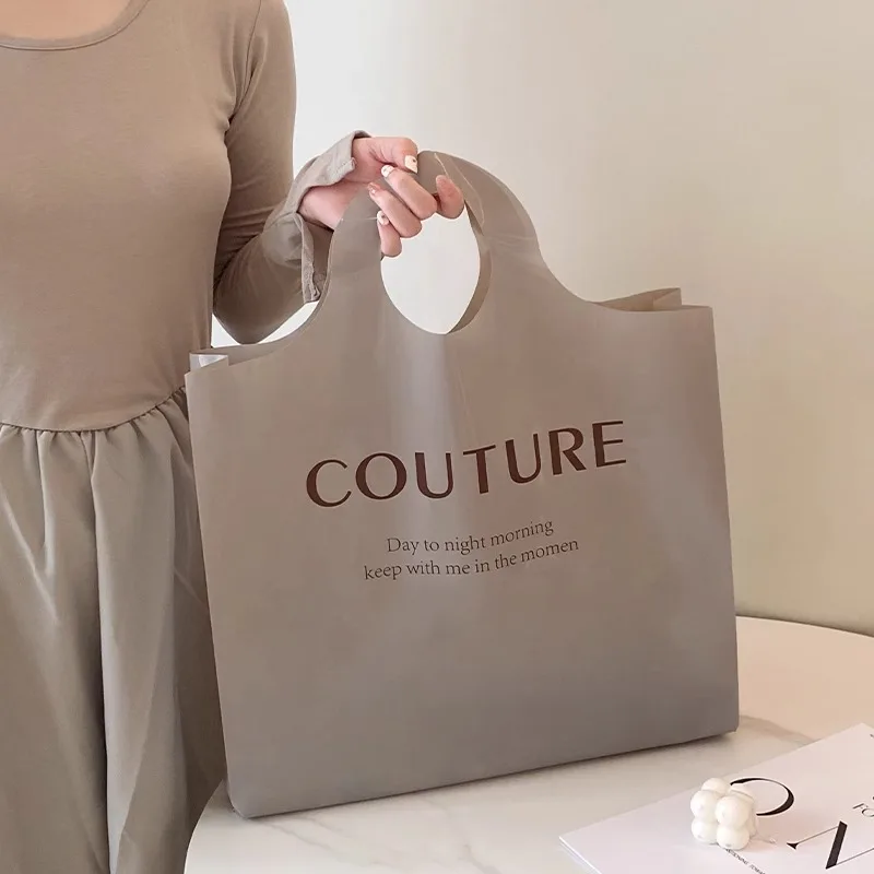 Explosive clothing store thickened plastic portable shopping bags clothes with gift packaging bag spot wholesale