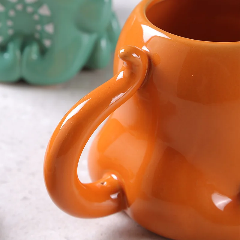 Hot sale halloween gift orange color glazed porcelain octopus cup custom mugs creative ceramic coffee mug