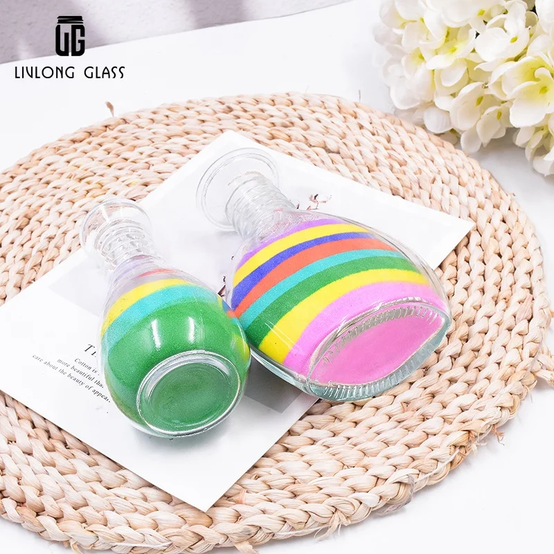 Customize a series of 40 ml to 240 ml clear decorative art  sand  glass bottle