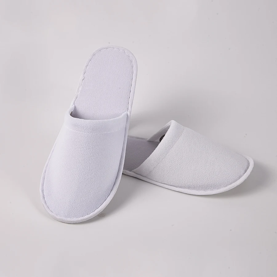 2023 hot selling custom logo anti slip sole terry towel upper hotel slippers white hotel disposable slippers