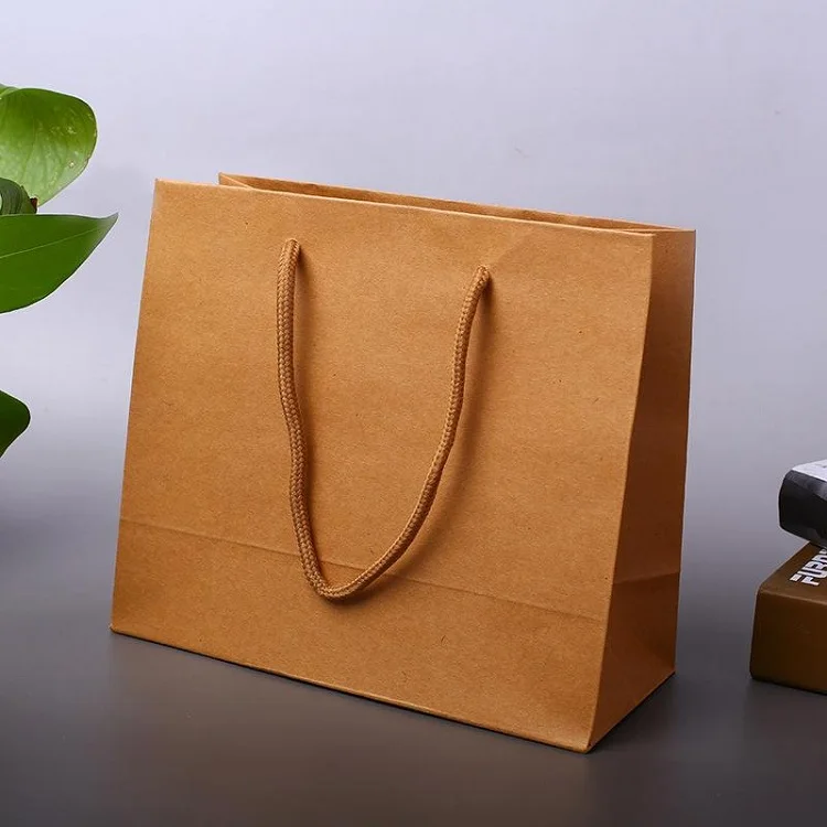 High quality custom logo printed rope handle paper bag paper shopper kraft clothes shopper with rope handle
