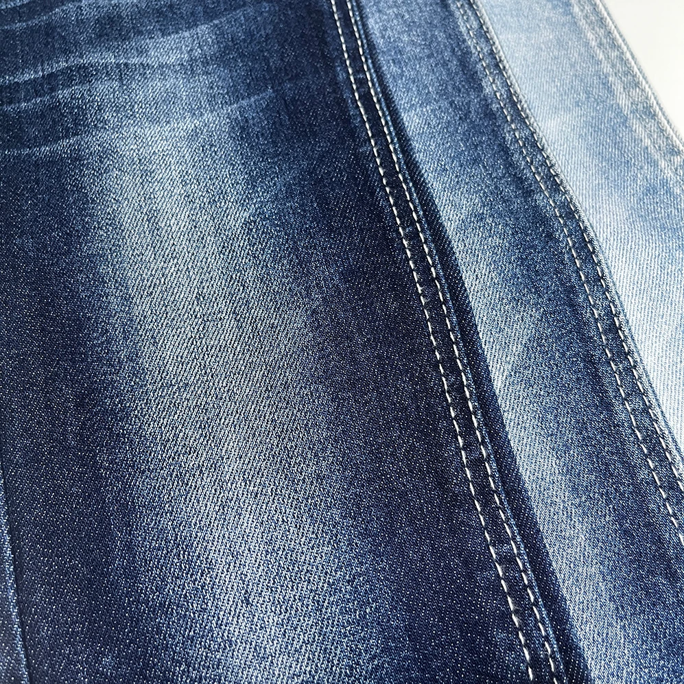 Wholesale Rolls Of 11.5oz Denim Fabric TC Yarn Raw Material 3/1 Twill For Jeans Indigo Rope Dyed Denim Fabrics