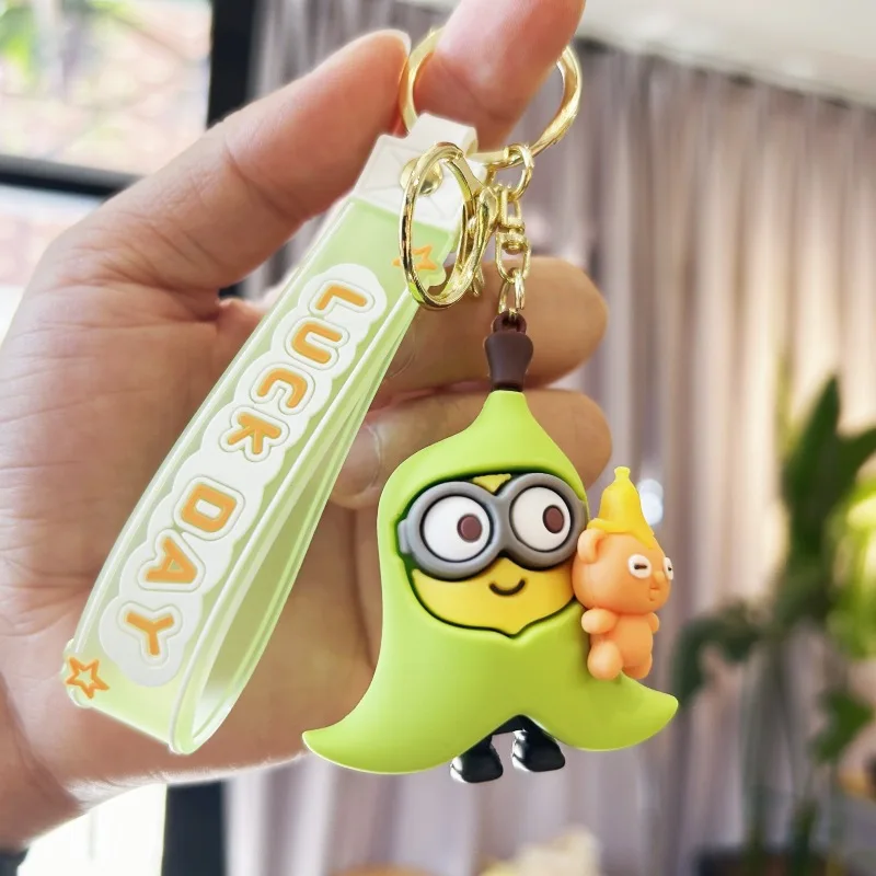 New creative cartoon cross dressing hoodie small yellow keychain PVC rubber pendant doll student backpack pendant accessories