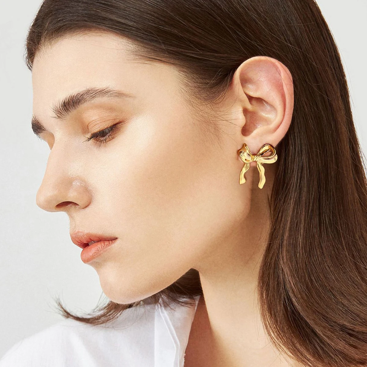 Fashion jewelry 18k gold plated bow jewelry 925 sterling silver needdle hypoallergenic bow stud earrings for women