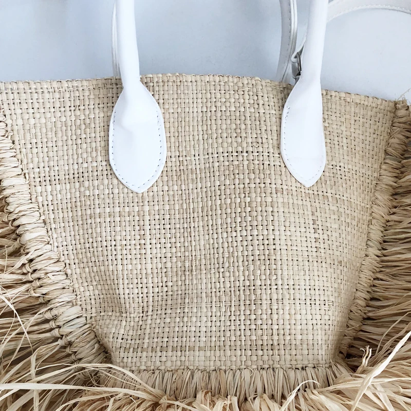 
2021 Hot Sale Beautiful Handmade Straw Purse Handbag Natural Fringe Tassel Raffia Straw beach Tote bag With Lining Fabric 