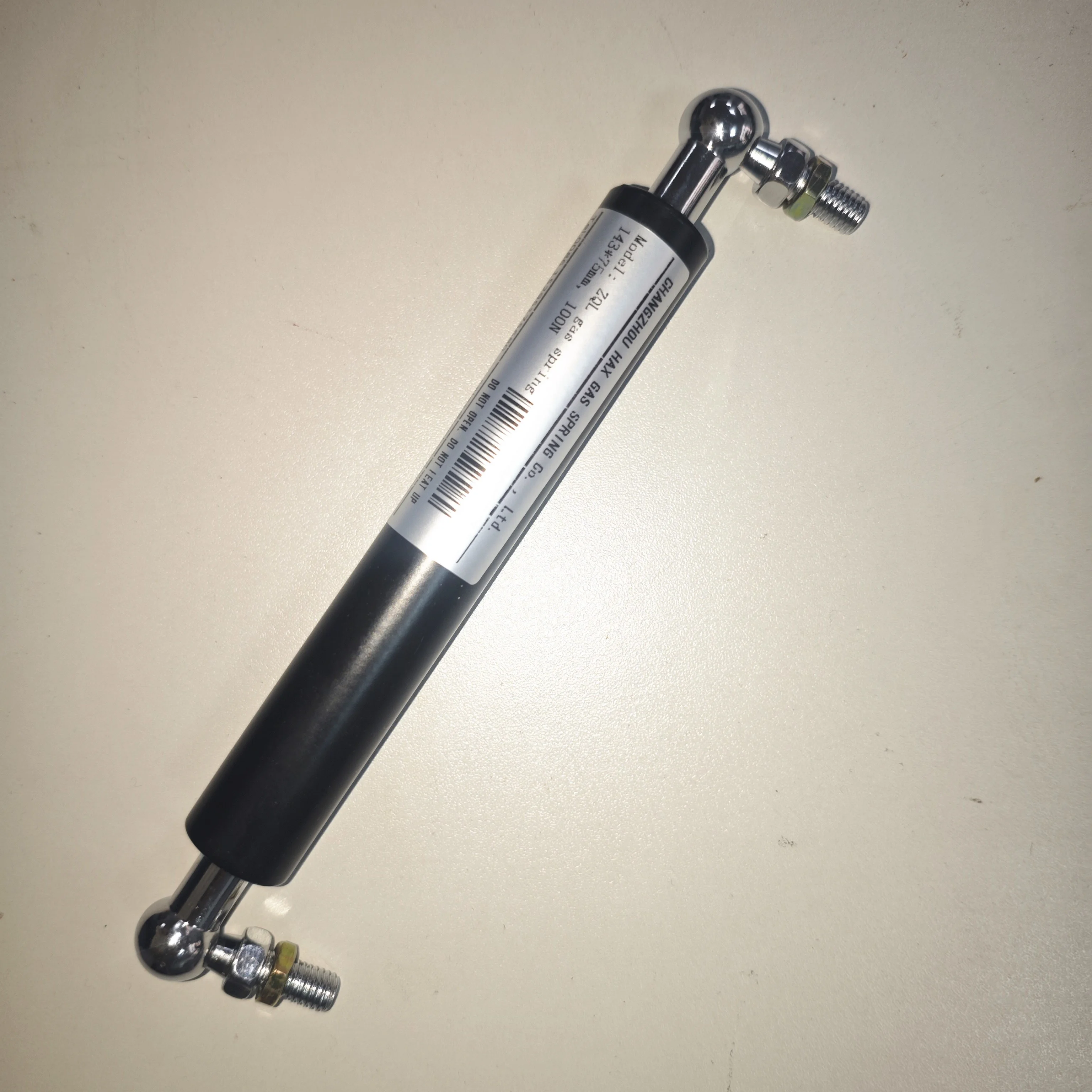 spring-loaded gas spring monitor arm