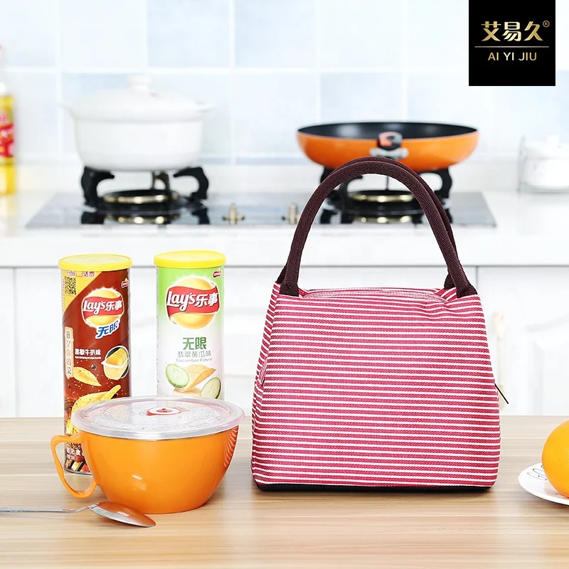 Stripe insulated lunch bag lunch box of male and female children having a picnic lunch box leakage protection bags