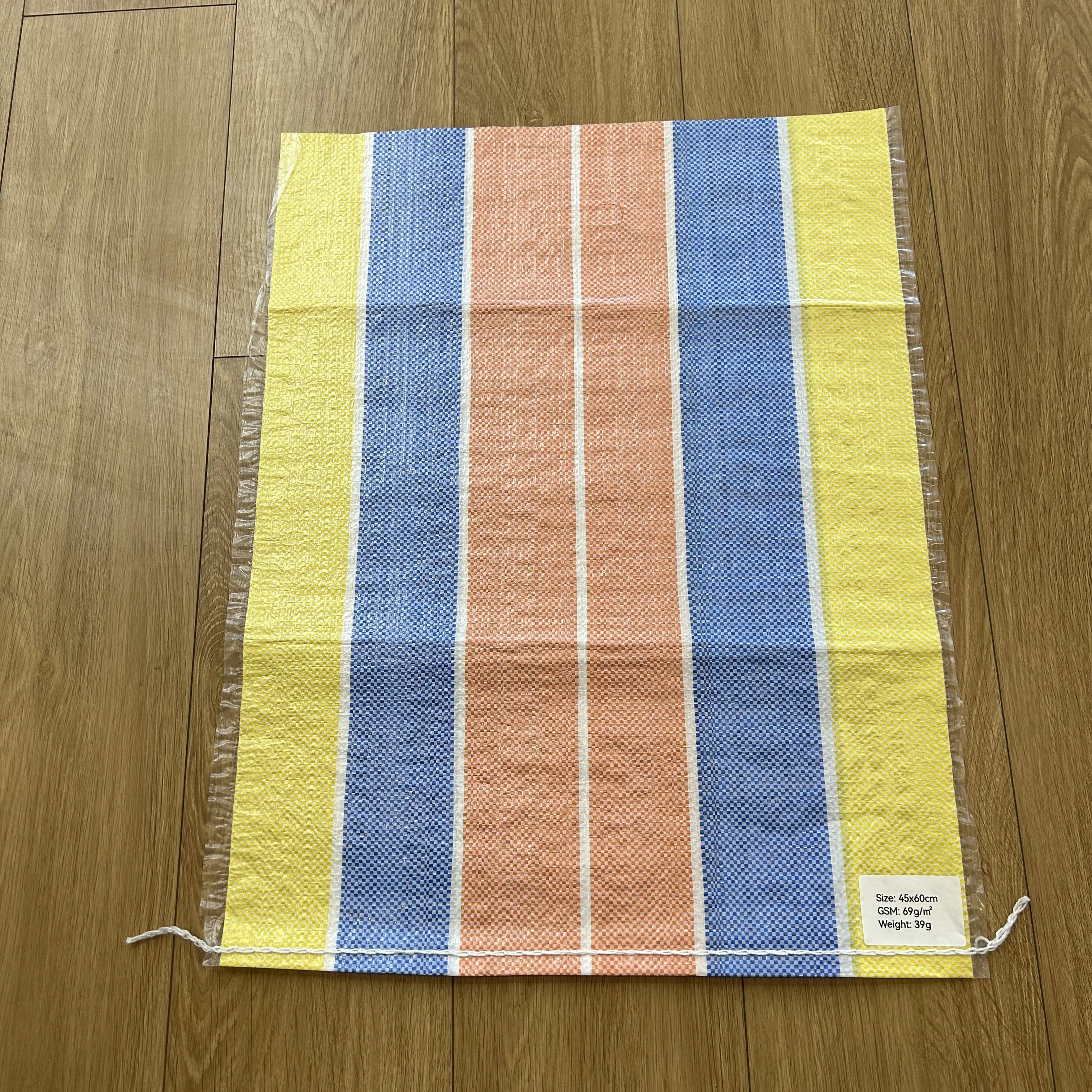 Ghana Multi-color Stripes Laminated PP Woven Shopping Bag Polypropylene Market Sacks With D-cut Handle For Grocery Packaging