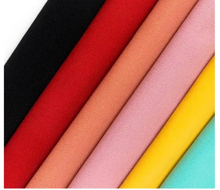 Wholesales High quality cheap price 100% polyester knitted suede plain dyed solids stock fabric Customizable soft