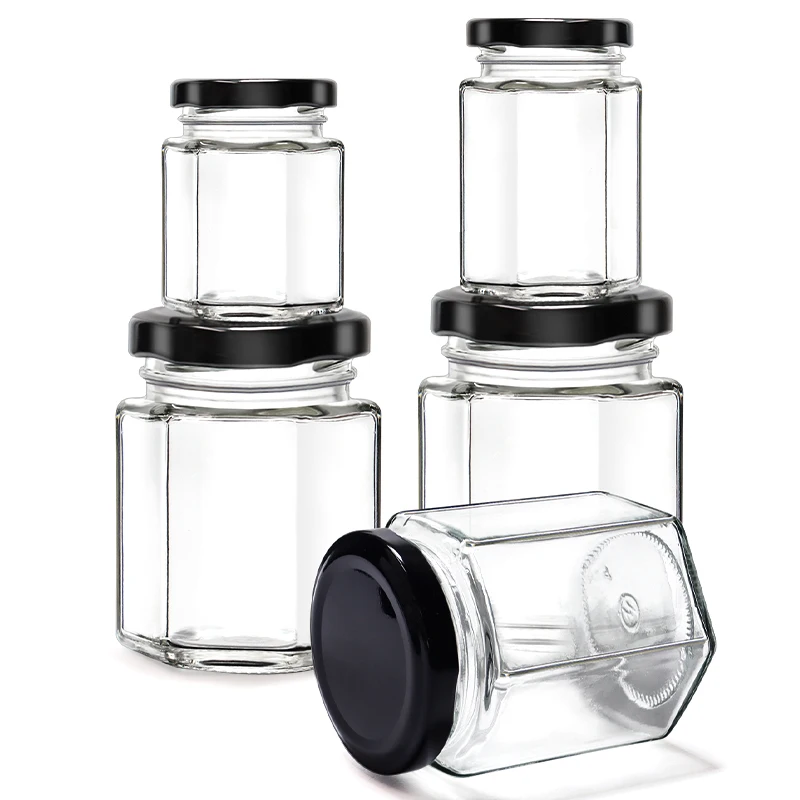 Cheap Spice Bottle Storage Hexagonal Honey Jam Food Small glass bottles for honey packing with Lid