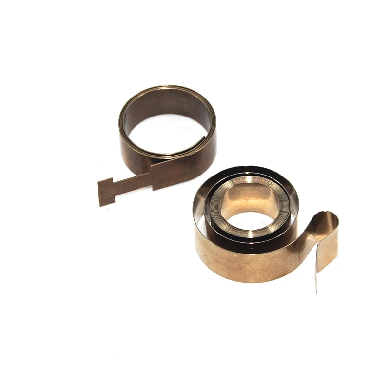 Large size springs for industrial equipment and medical devices Scroll Power wind up spring