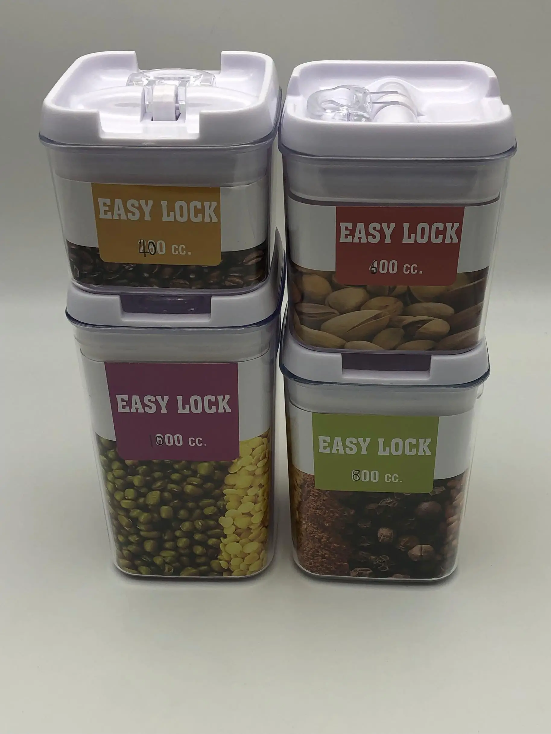 Set of 4 Plastic Canister Jars with Air Tight Lids for Kitchen or Bathroom Food Cookie Cracker Storage Containers