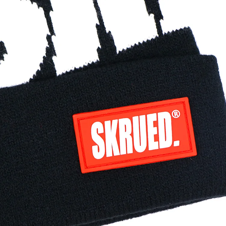 Hengxing christmas men women winter warm black white jacquard custom rubber patch logo knitted beanie
