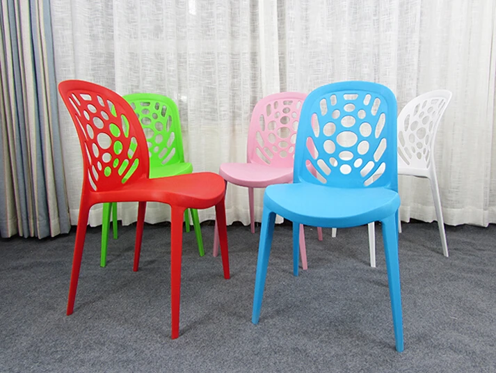 High - quality low - price manufacturers wholesale wedding banquet activities plastic chair can be stacked hole hole chair