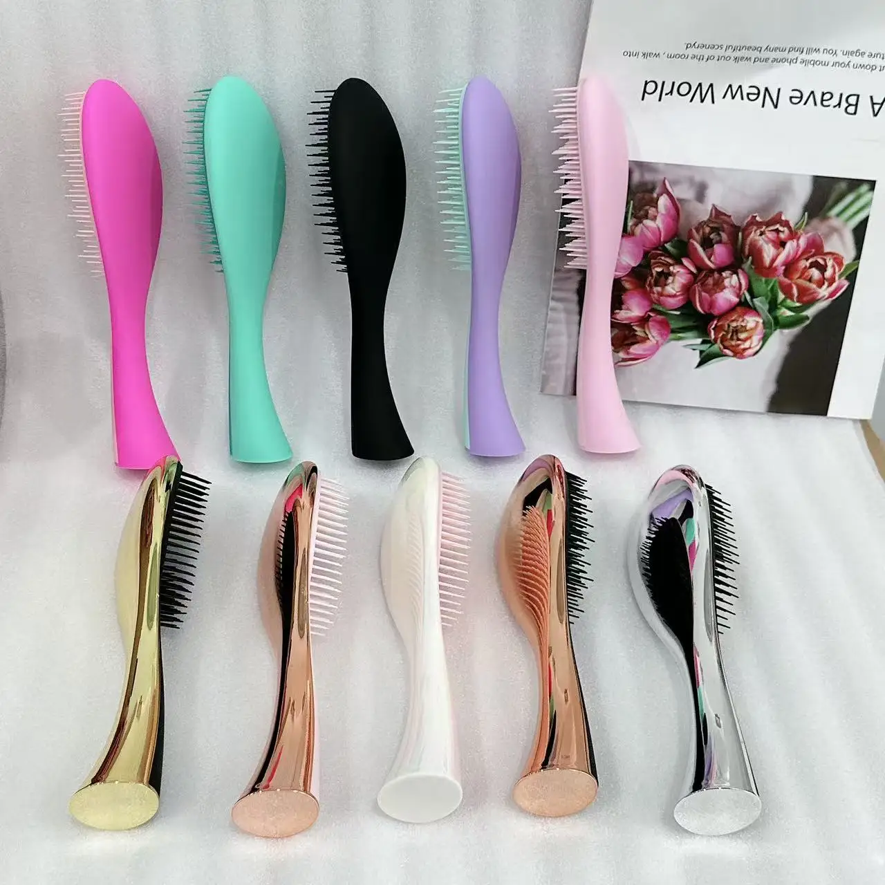 Customized logo hot selling anti-static massage brush travel portable exfoliating egg shaped hair brush