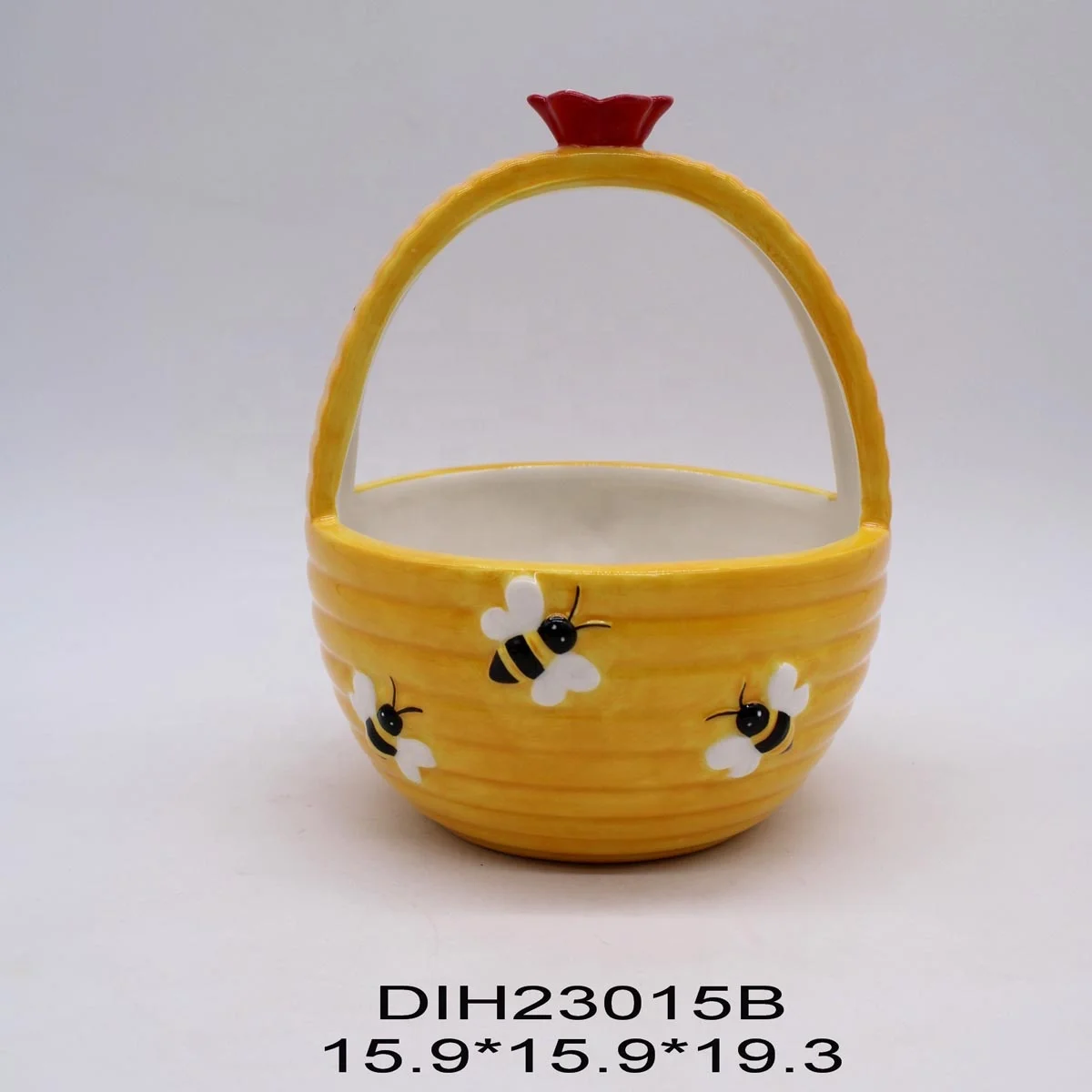 Handpainted ceramic basket with bee decoration