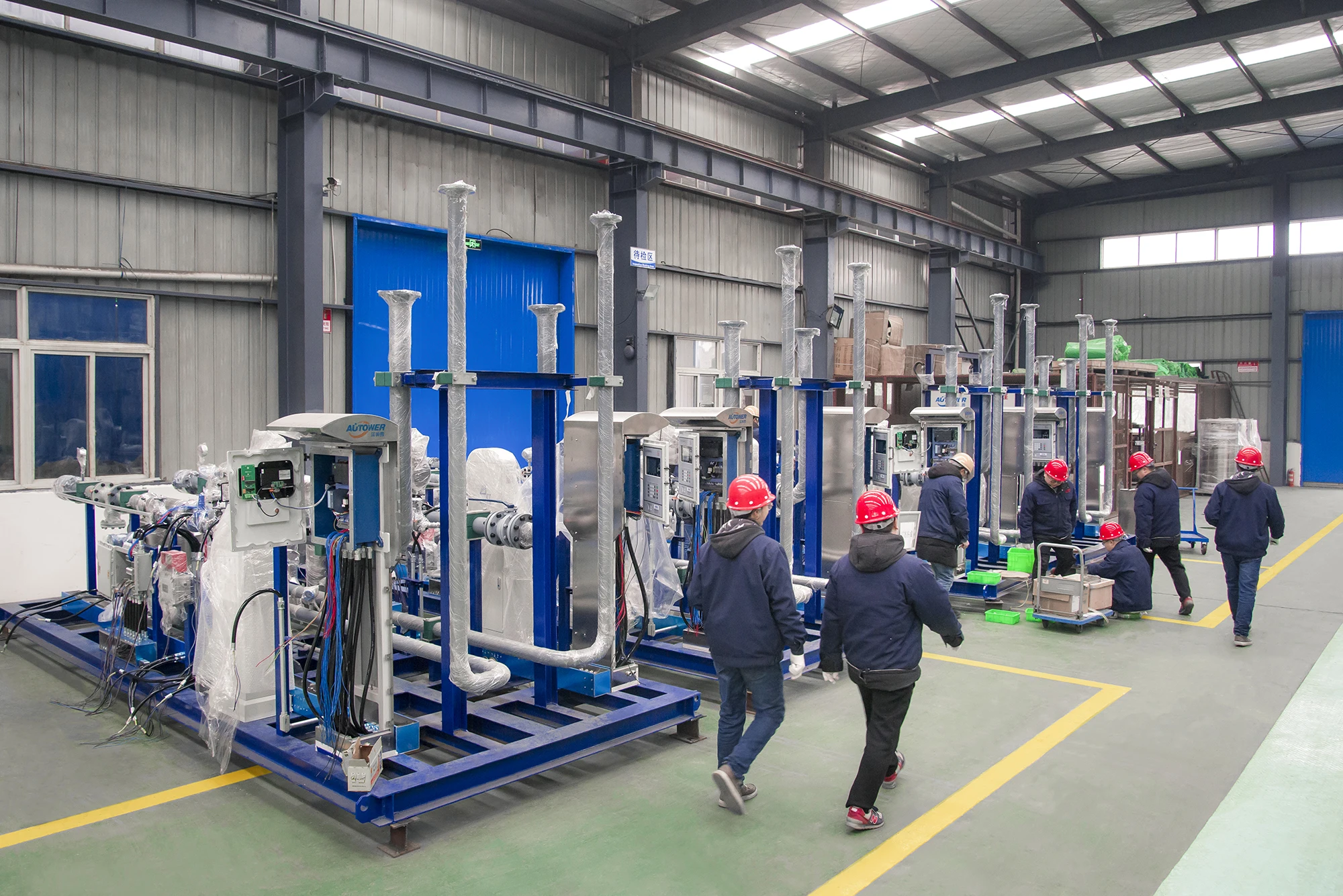 Multi-station hydrogenation metering skid mounted filling system with loading arm for loading/unloading chemical liquid