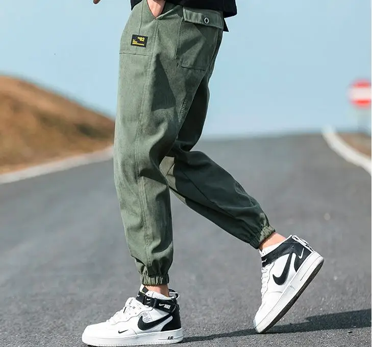 
2020 Autumn/winter plus fleecy pants for men loose-fitting sport long pants with thickening and large size corset overalls for m 