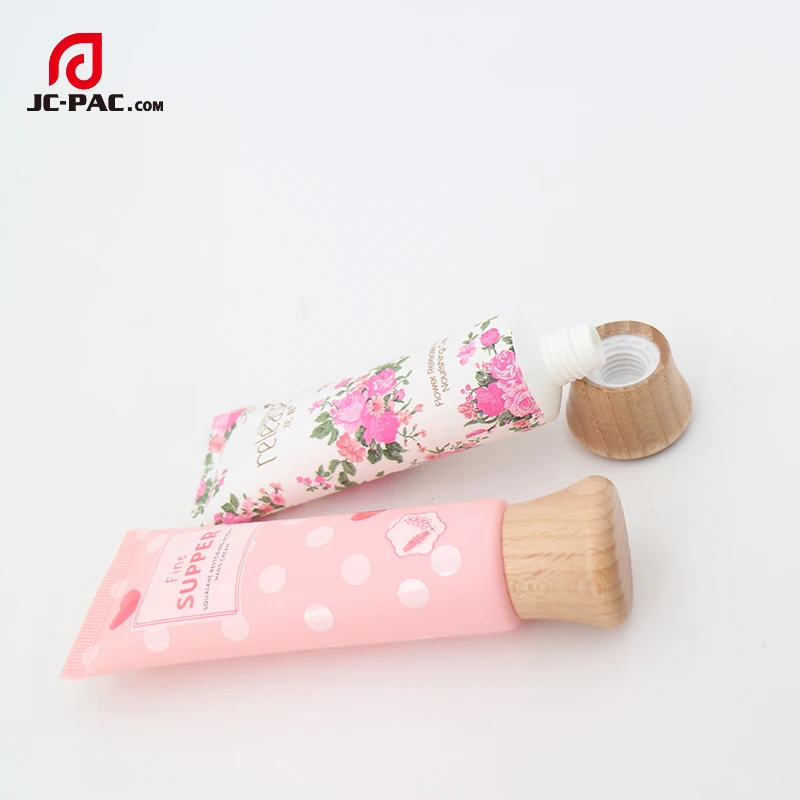 
Clear Plastic Skin Care Packaging Manufacturer Tube With Wooden Grain Screw Lid 60ml 80ml 100ml 