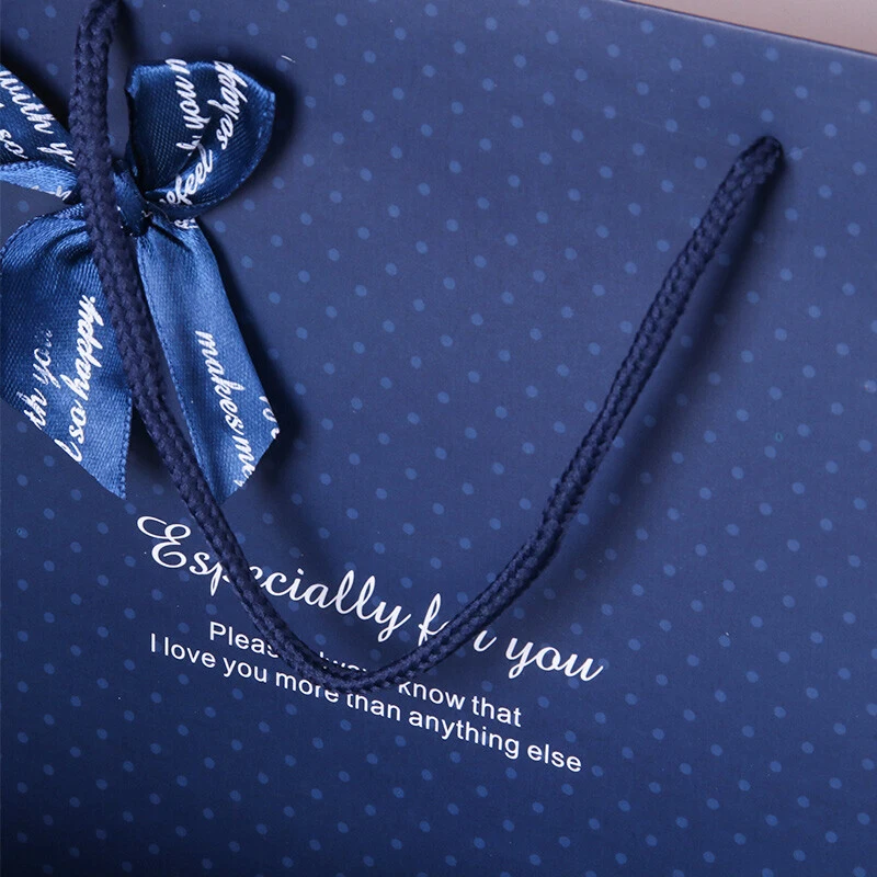 Luxury brand custom logo gift paper bag for clothes blue matte garment clothing boutique packaging bags with ribbon bow