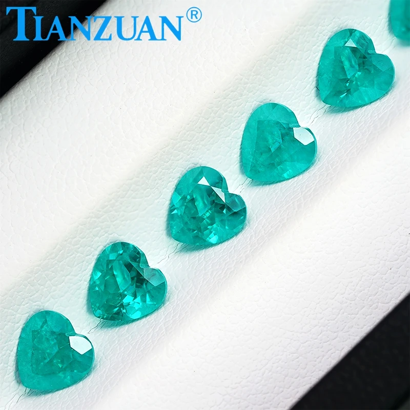 heart shape Paraba color Yttrium Aluminum Garnet Cultivated Tsavorite with inclusions artificial gem stone