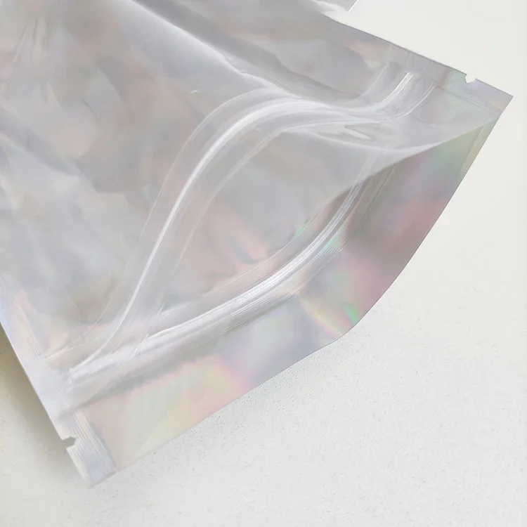 15x22 cm Custom Laser Film Packing One Side Clear Stand Up Pouch Holographic Cosmetic Bag