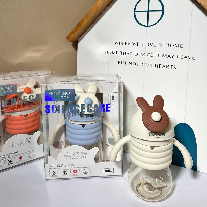 Hot Selling 300ml Baby Feeding Training Cup with Handle and Drinking Straw for Kids and Baby Water Bottle