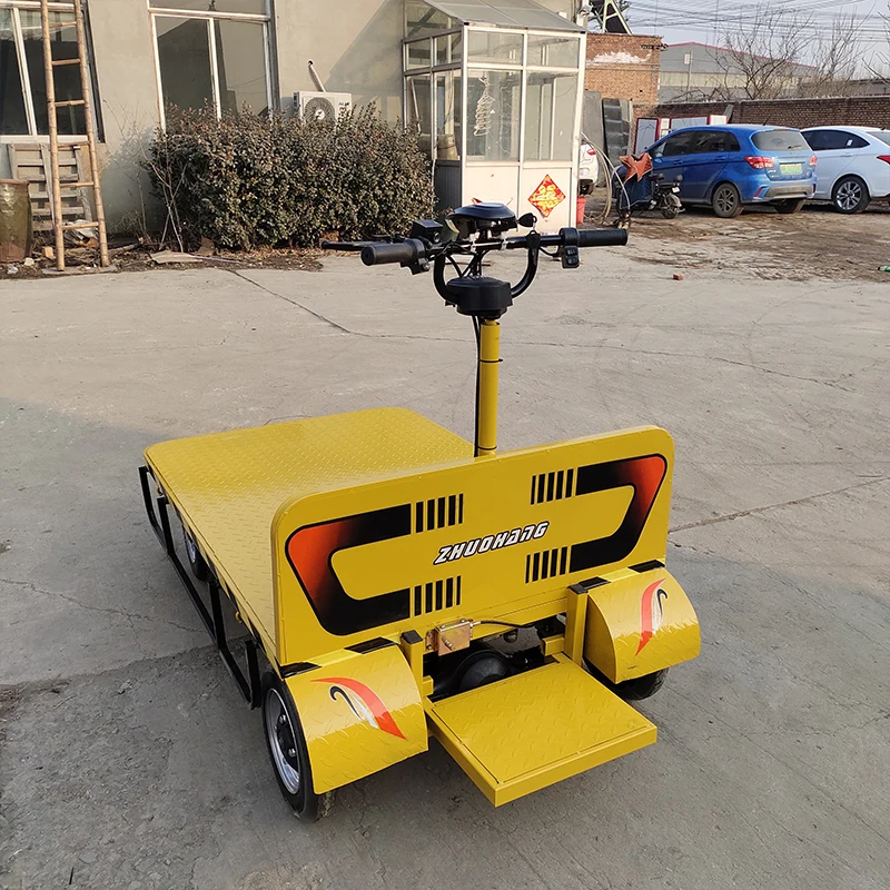 Customized station driving type reverse riding electric flat 4 wheel truck warehouse plant hauler