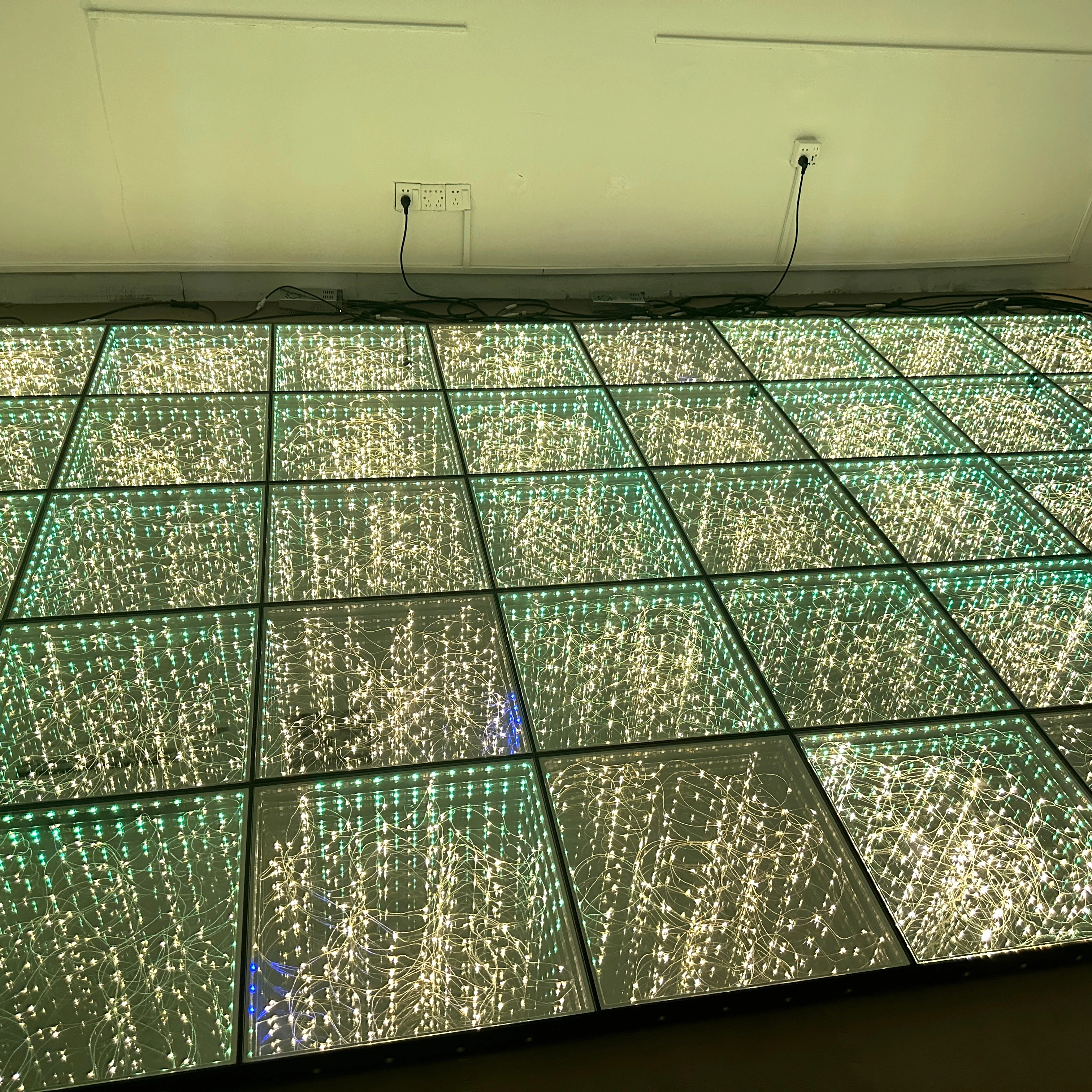 Transform your event with the magnetic LED 3D infinity floor combines with artistic flair for an unforgettable atmosphere