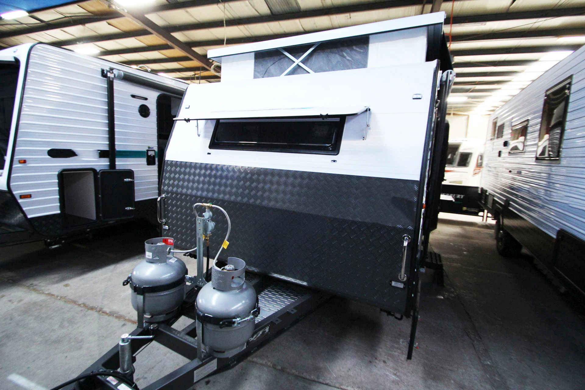 
Mini Lightweight Camping Travel Mover Pop Top Caravan Trailer Made in China 